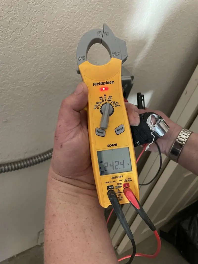 Voltage testing with clamp meter during Aluminum Wiring Replacement in Conway